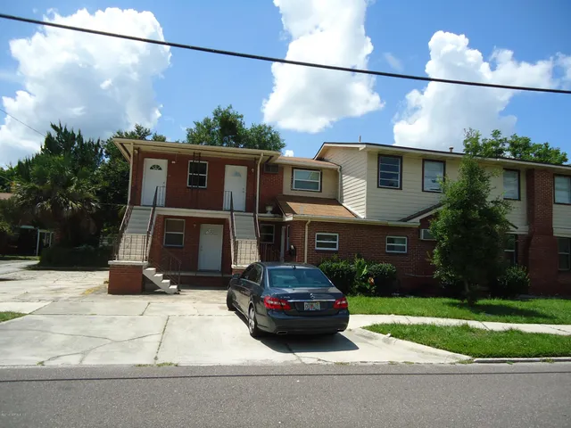 a car parked in front of a house
