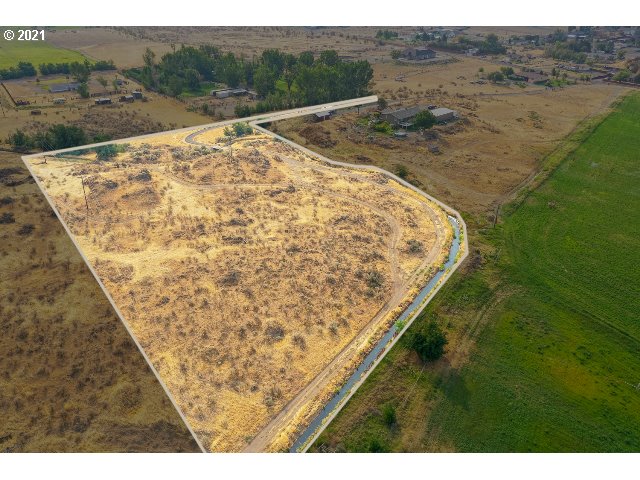 a view of a lake with a yard