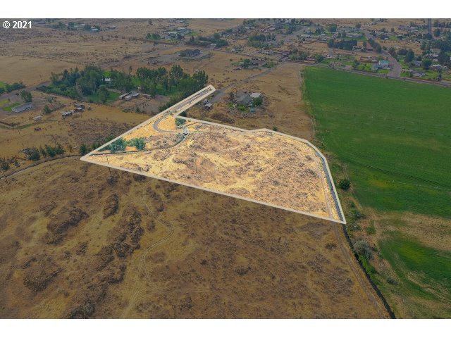 Joy Hermiston, OR 97838 - Photo 13 of 13 a view of a dry yard with trees