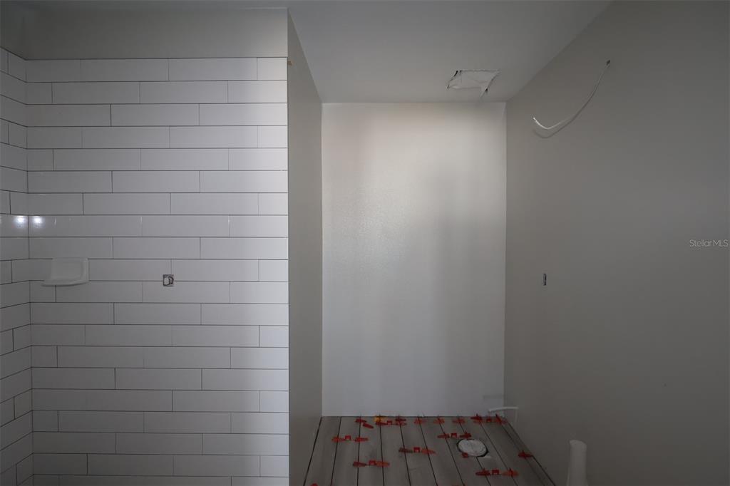 4116 Campsite Loop Orlando, FL 32824 - Photo 3 of 10 a bathroom with a shower