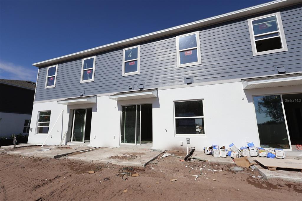 4116 Campsite Loop Orlando, FL 32824 - Photo 5 of 10 a building view with a outdoor space