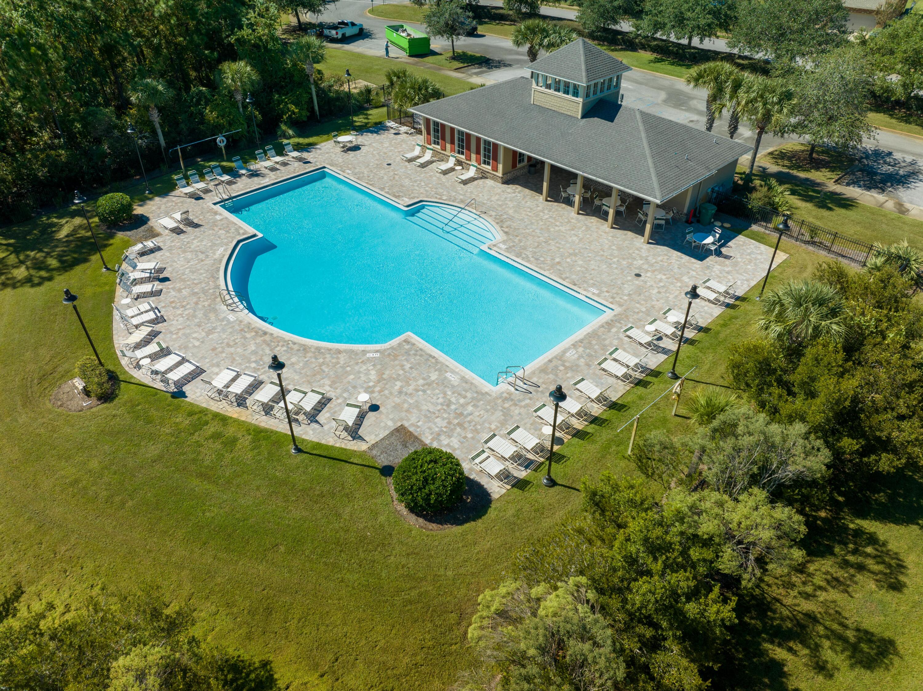 1069 Cocobolo Drive Santa Rosa Beach, FL 32459 - Photo 45 of 46 an aerial view of a house with swimming pool and outdoor seating