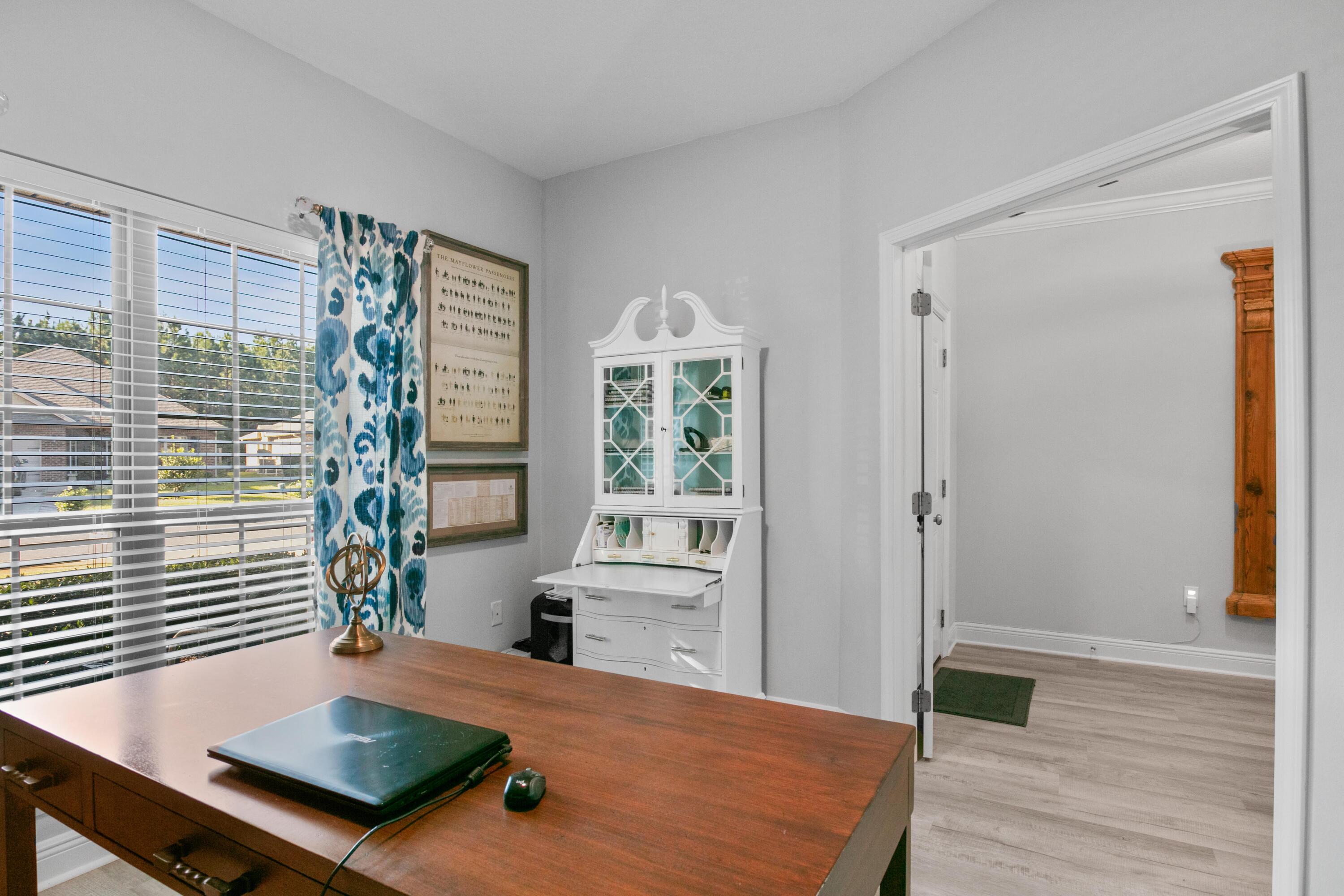1069 Cocobolo Drive Santa Rosa Beach, FL 32459 - Photo 8 of 46 a view of a livingroom with furniture and window