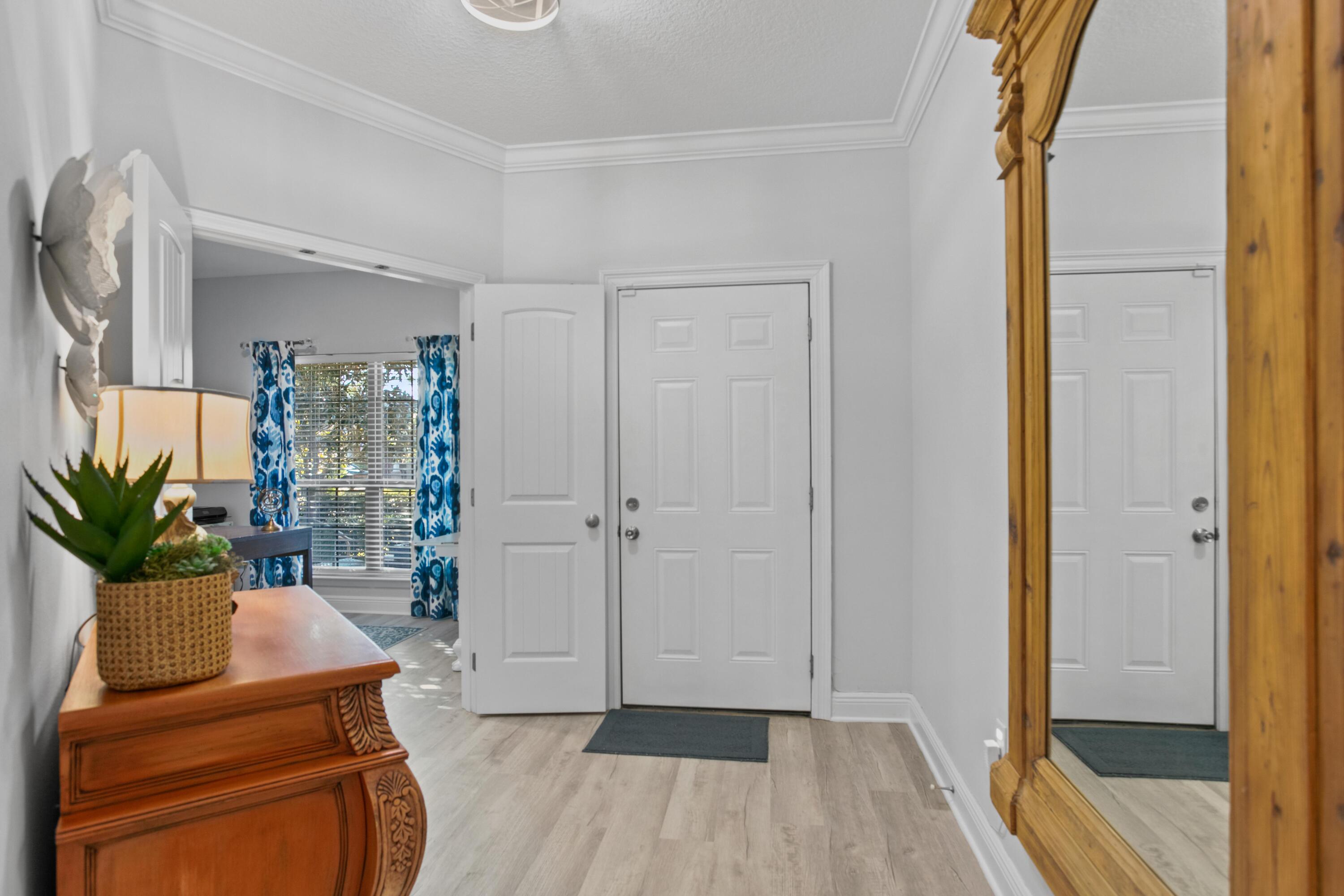 1069 Cocobolo Drive Santa Rosa Beach, FL 32459 - Photo 9 of 46 a living room with furniture and a potted plant