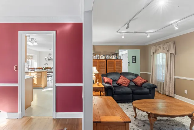 a living room with furniture and a table