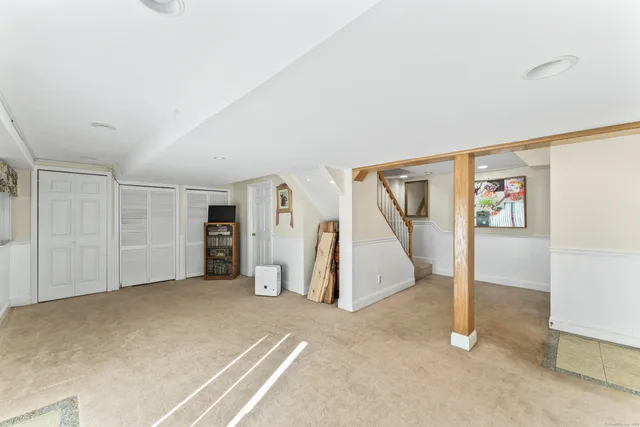 a view of a livingroom with wooden floor