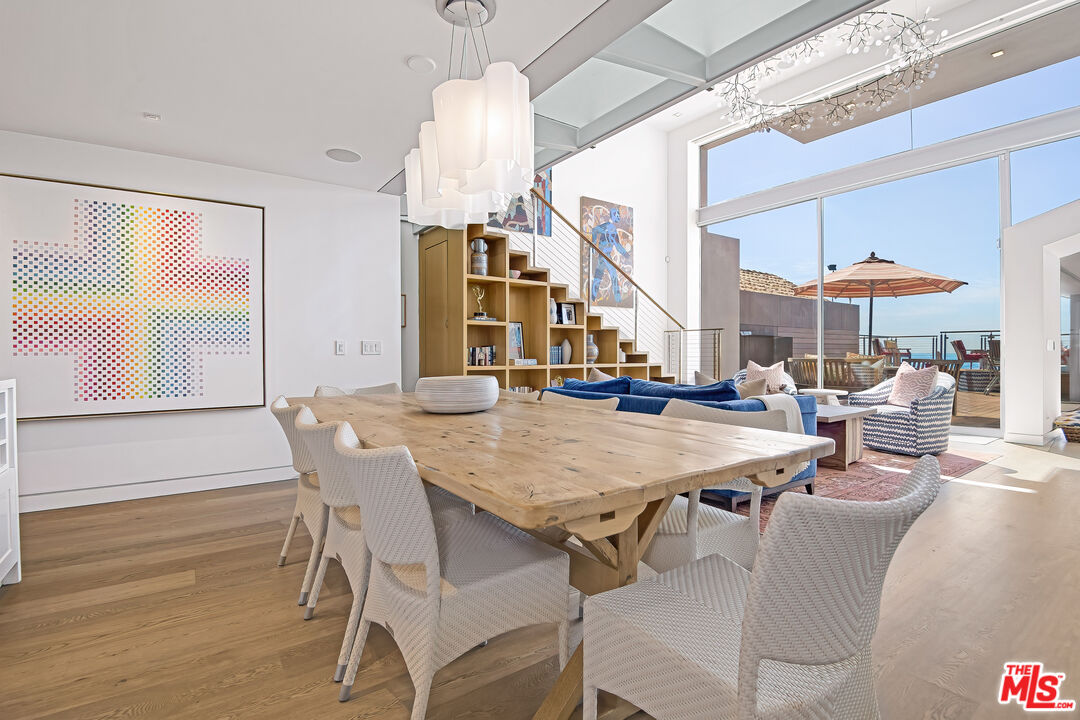 23536 Malibu Colony Road Malibu, CA 90265 - Photo 11 of 44 a view of a dining room with furniture window and wooden floor