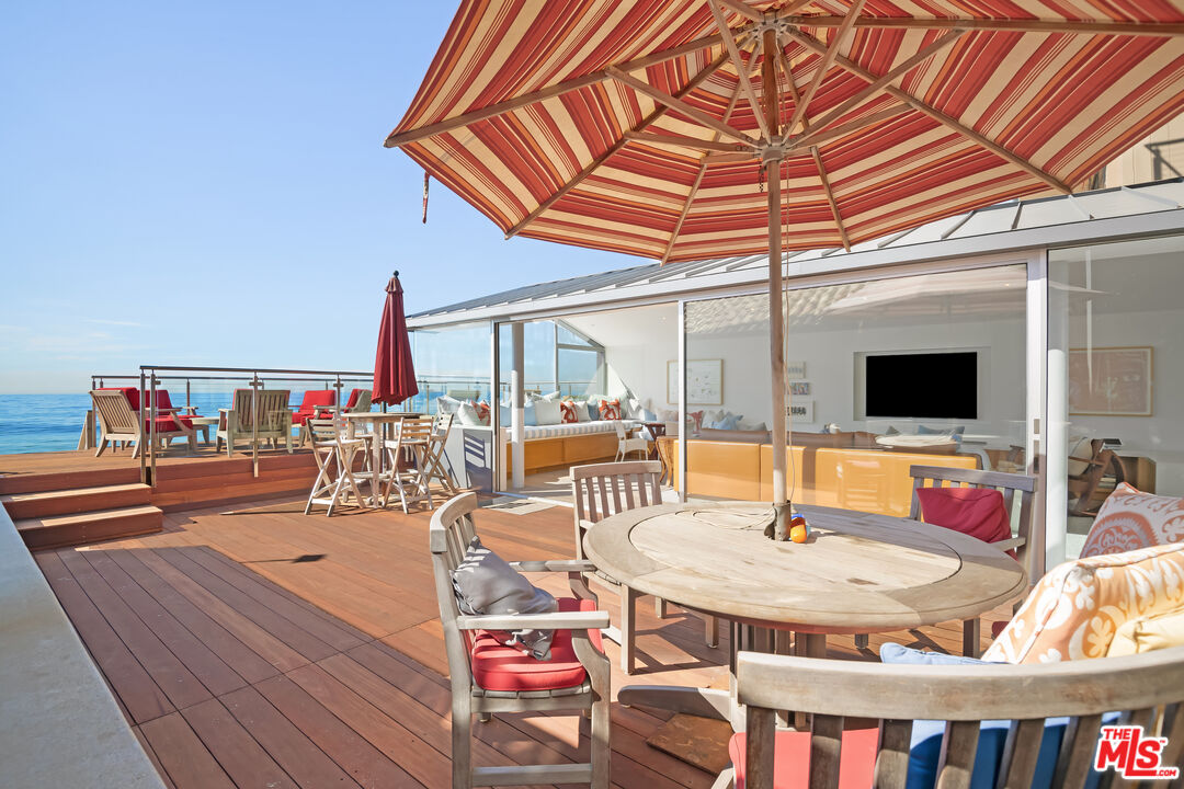 23536 Malibu Colony Road Malibu, CA 90265 - Photo 2 of 44 a outdoor space with a table and chairs