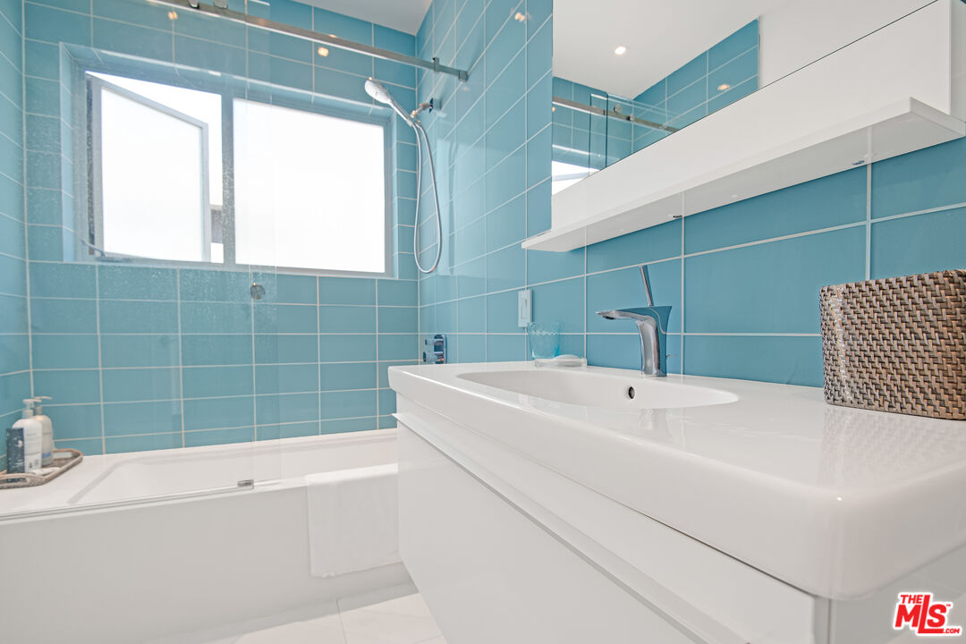 23536 Malibu Colony Road Malibu, CA 90265 - Photo 29 of 44 a bathroom with a sink and a bathtub