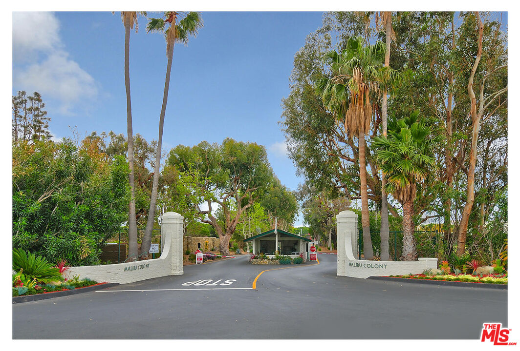 23536 Malibu Colony Road Malibu, CA 90265 - Photo 44 of 44 a street view with large trees