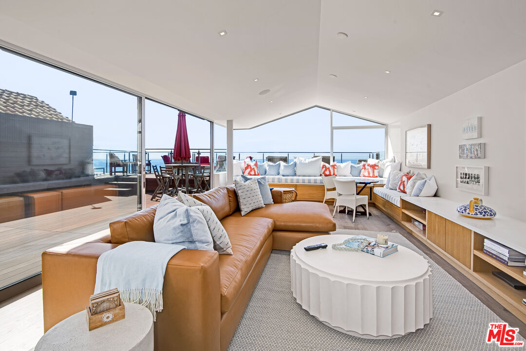 23536 Malibu Colony Road Malibu, CA 90265 - Photo 7 of 44 a living room with furniture and a table