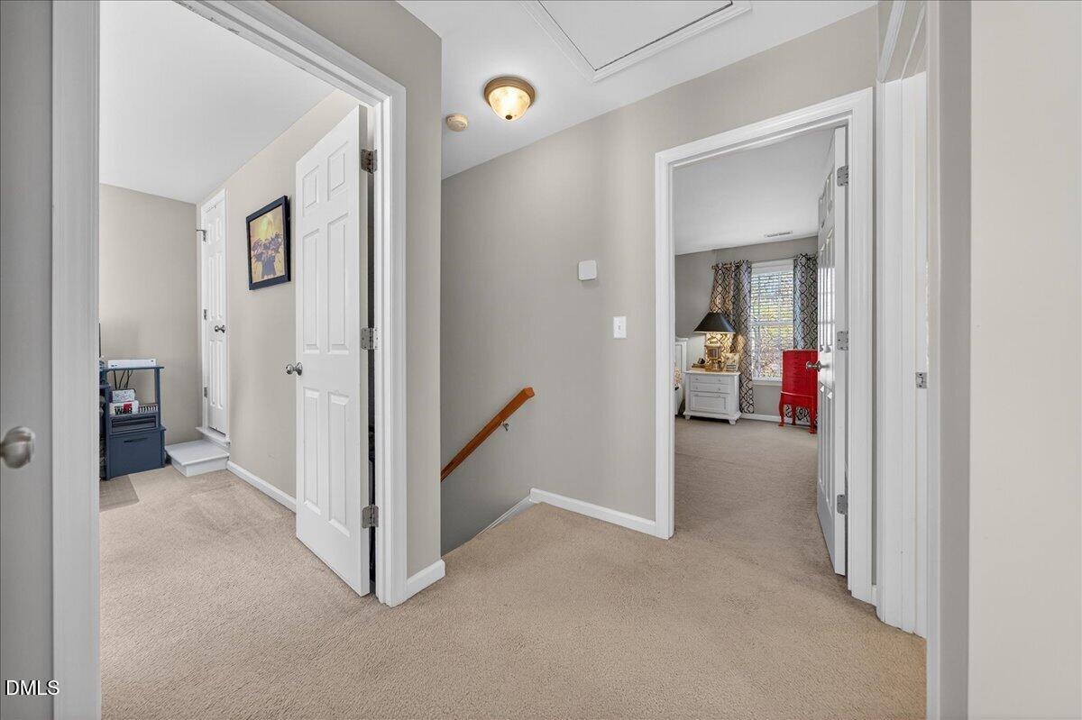 517 Lemon Pepper Place Wendell, NC 27591 - Photo 11 of 19 a view of a livingroom from a hallway