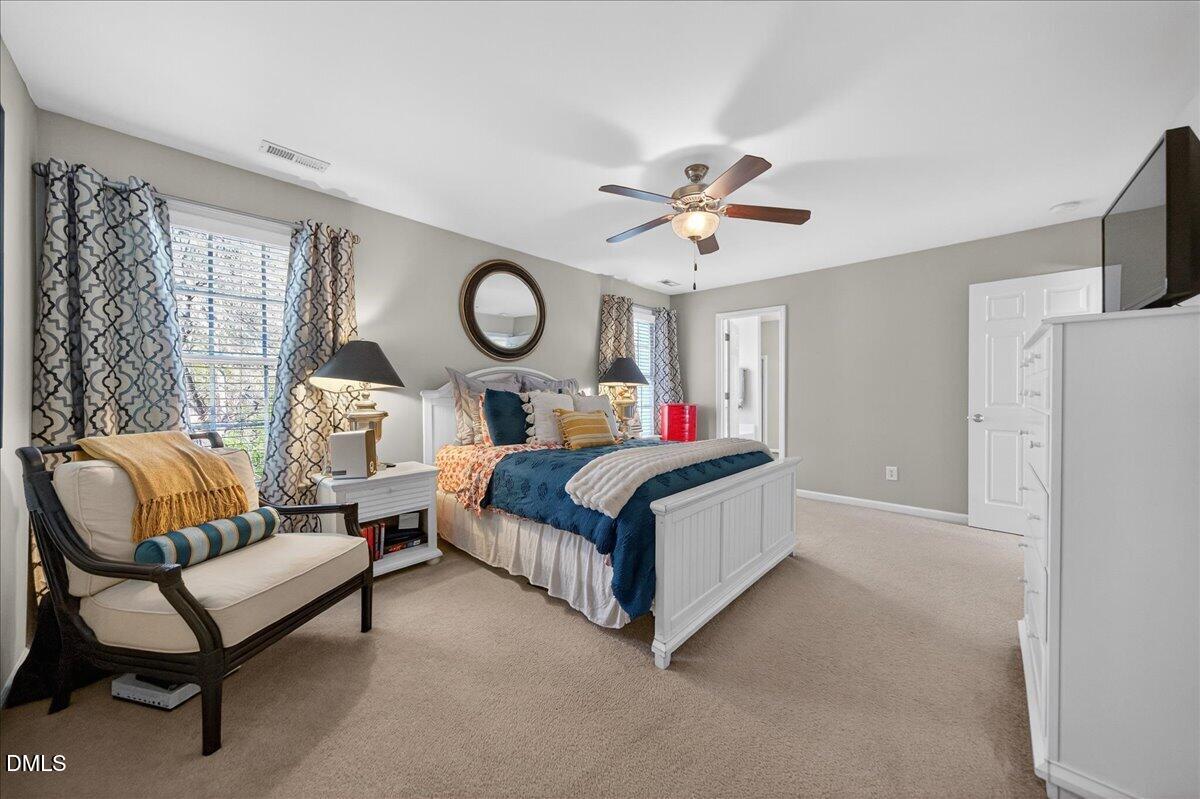 517 Lemon Pepper Place Wendell, NC 27591 - Photo 13 of 19 a living room with furniture and a large window