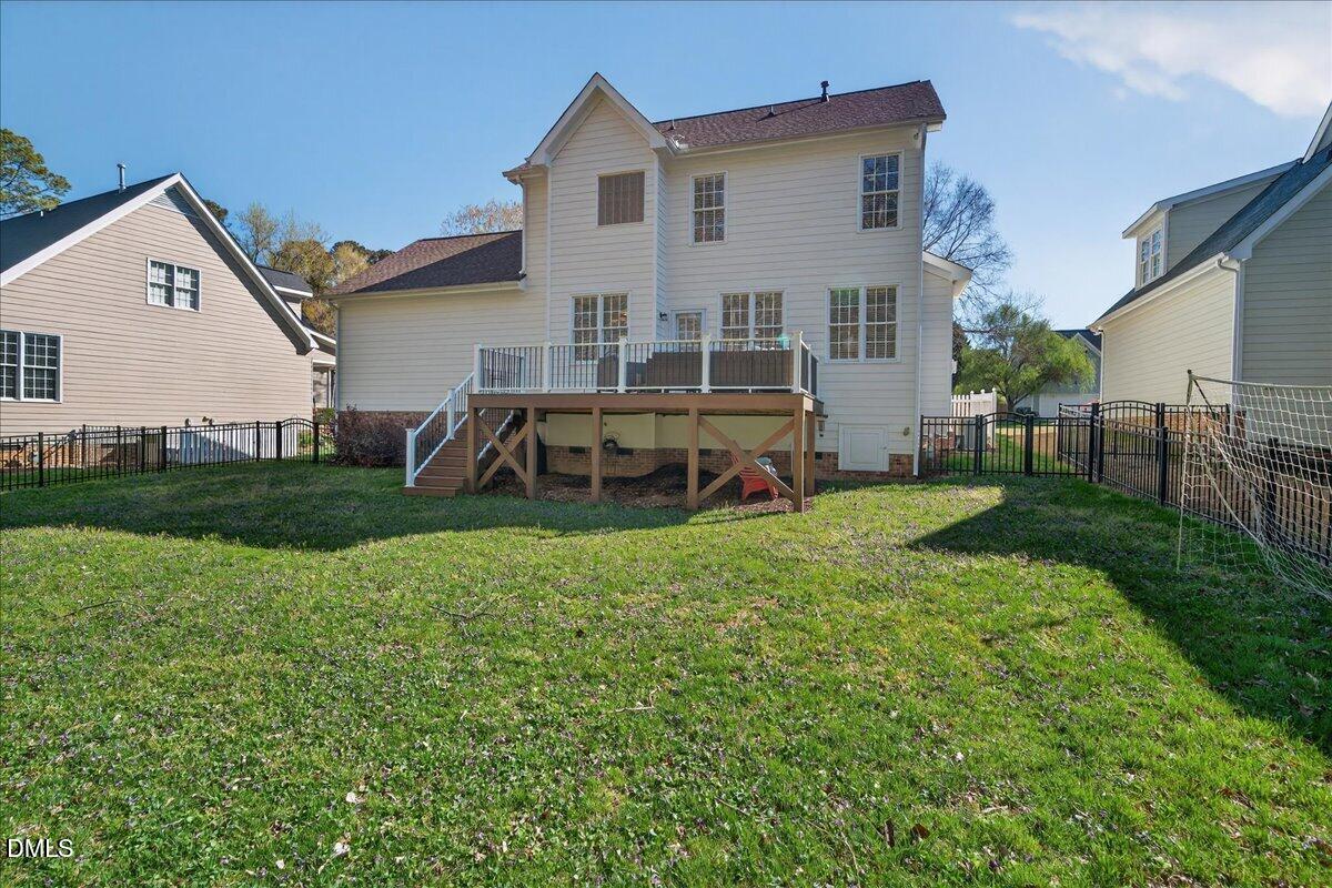 517 Lemon Pepper Place Wendell, NC 27591 - Photo 18 of 19 a view of a house with backyard