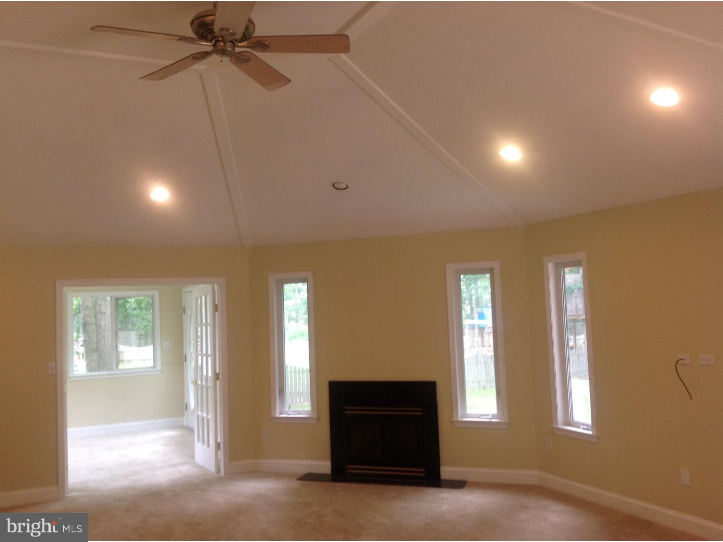 16 Oniontown Road Medford, NJ 08055 - Photo 11 of 25 a view of a livingroom with a ceiling fan and window