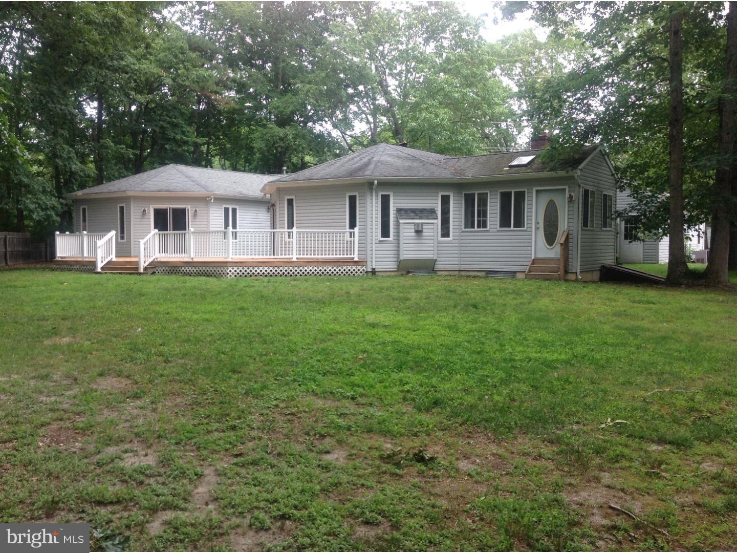 16 Oniontown Road Medford, NJ 08055 - Photo 21 of 25 a front view of a house with a garden