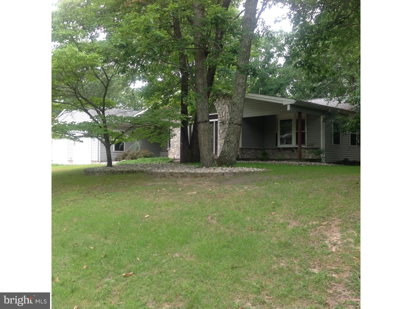 16 Oniontown Road Medford, NJ 08055 - Photo 22 of 25 a view of a backyard with a garden