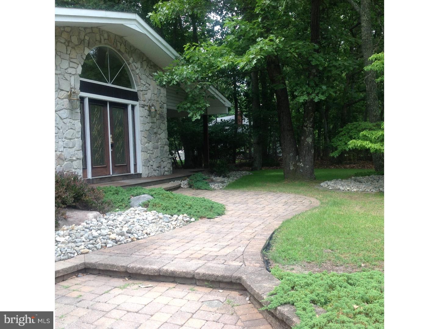 16 Oniontown Road Medford, NJ 08055 - Photo 24 of 25 a front view of a house with garden