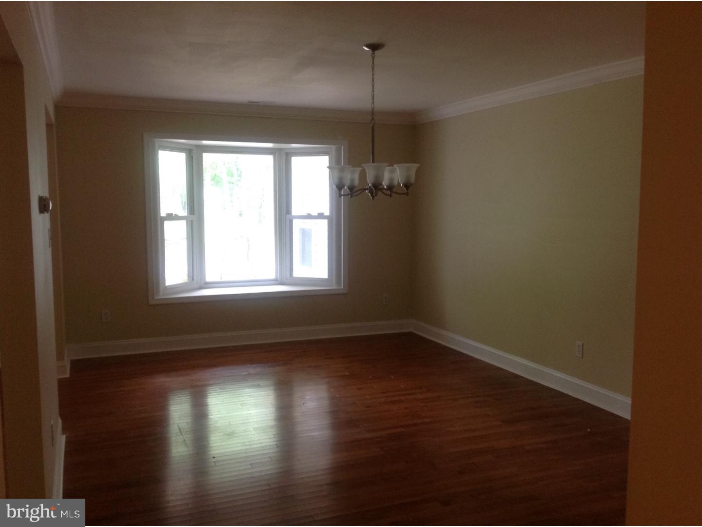 16 Oniontown Road Medford, NJ 08055 - Photo 4 of 25 a view of empty room with wooden floor and fan