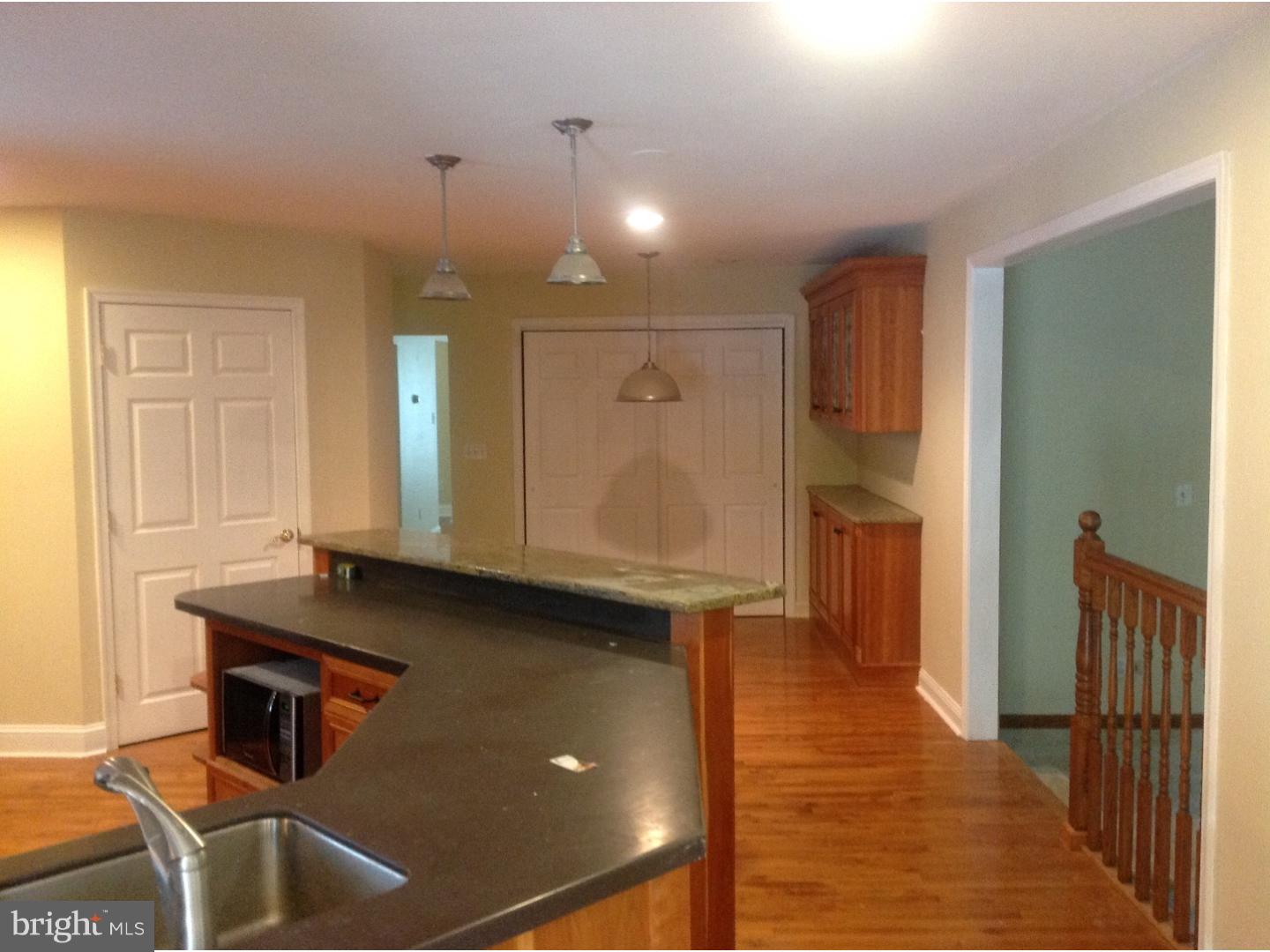 16 Oniontown Road Medford, NJ 08055 - Photo 9 of 25 a kitchen with stainless steel appliances granite countertop a sink a stove and a refrigerator