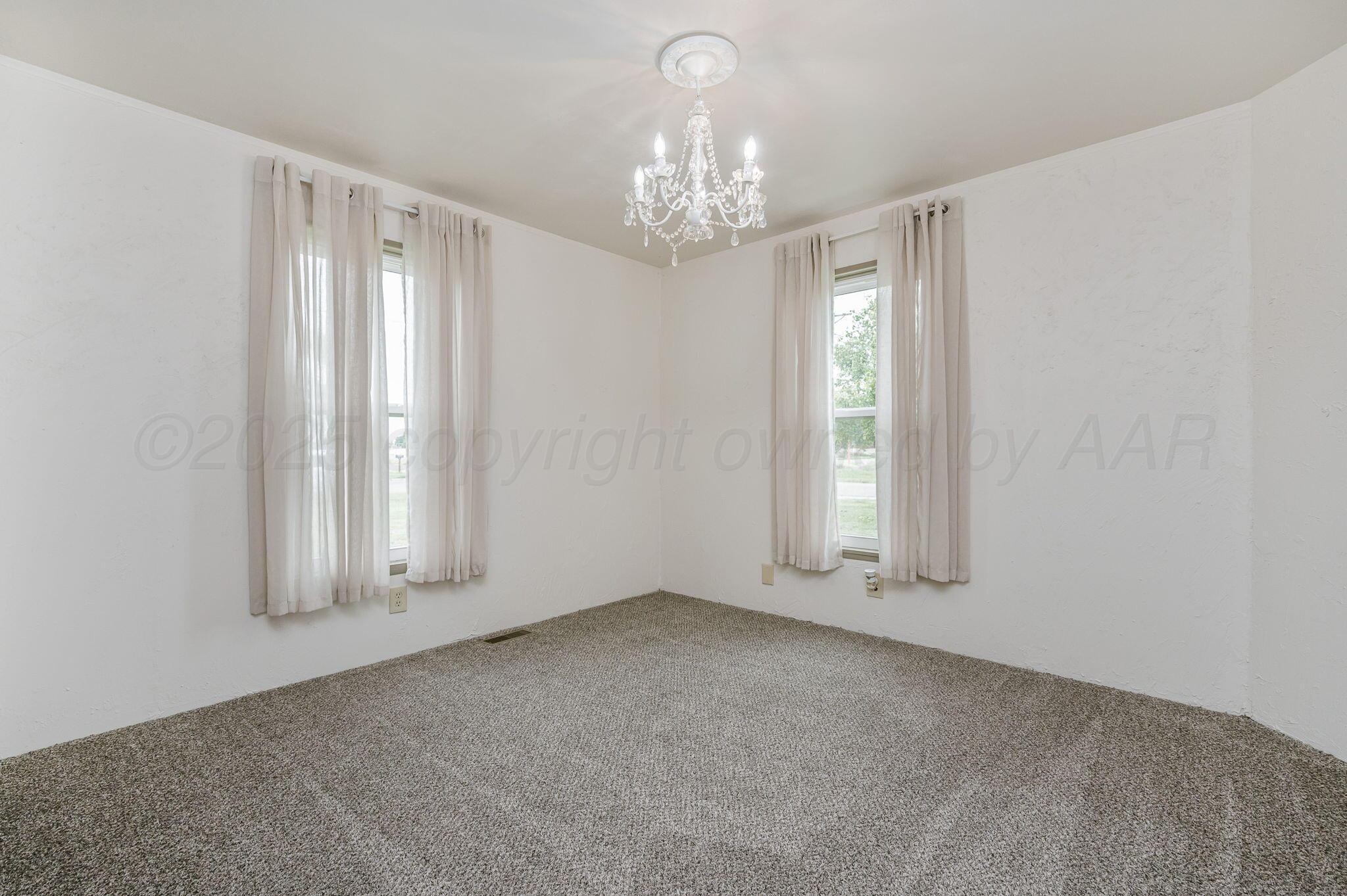200 5th Avenue Canyon, TX 79015 - Photo 13 of 18 a view of an empty room with window