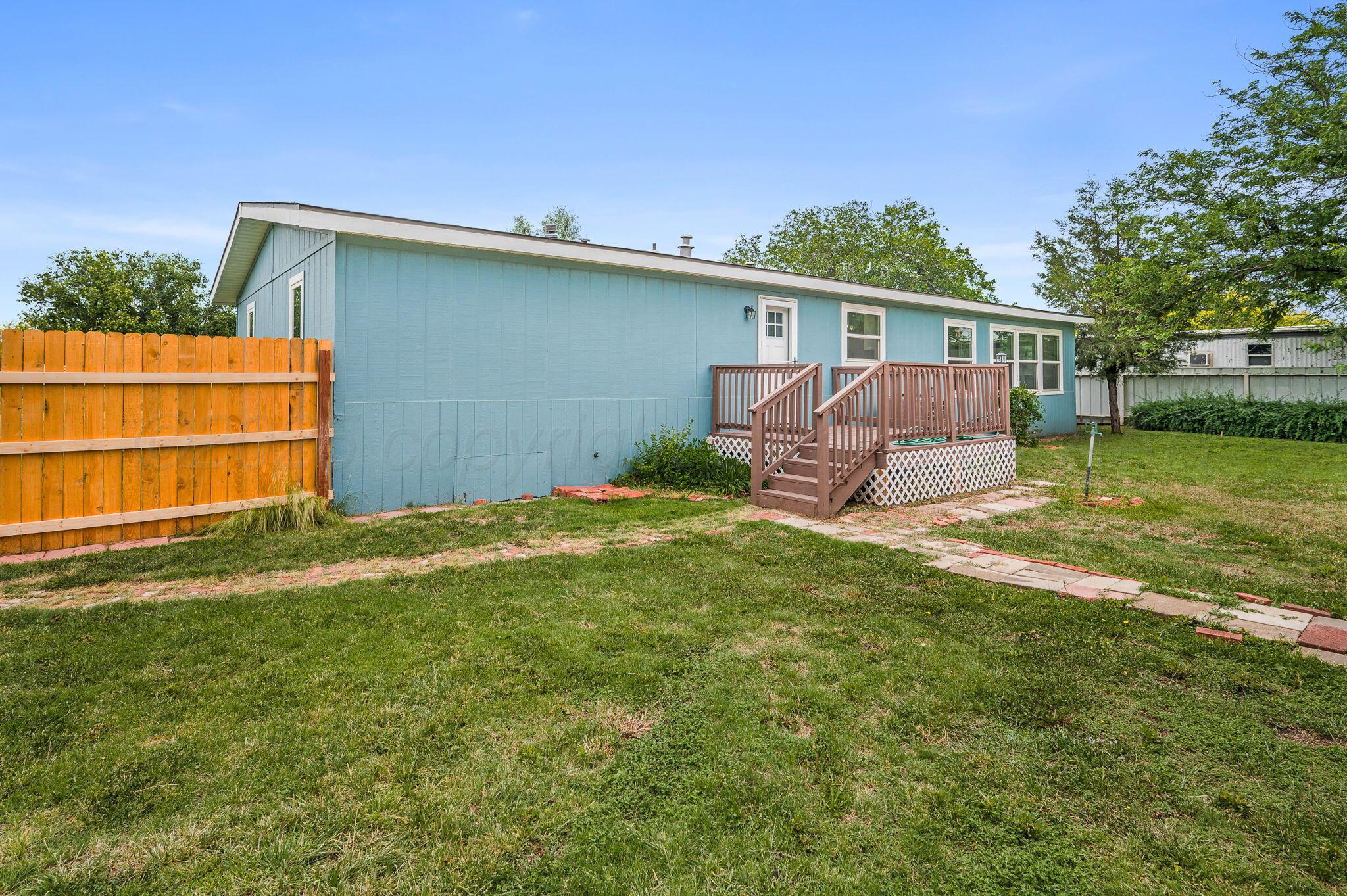 200 5th Avenue Canyon, TX 79015 - Photo 18 of 18 a view of backyard with deck