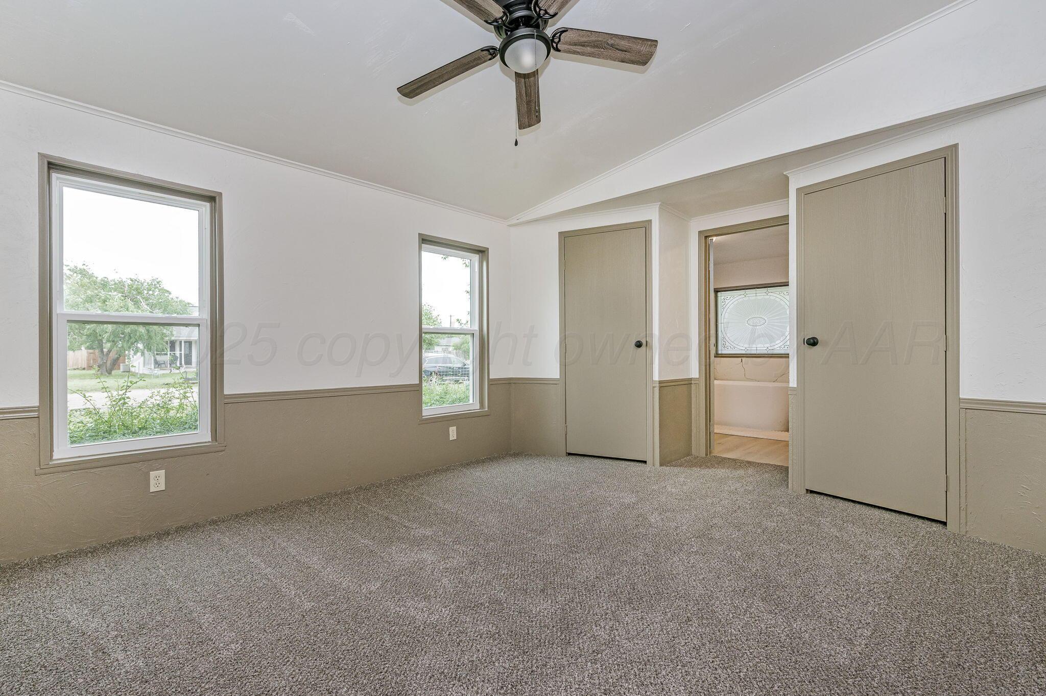 200 5th Avenue Canyon, TX 79015 - Photo 9 of 18 a view of an empty room with a window