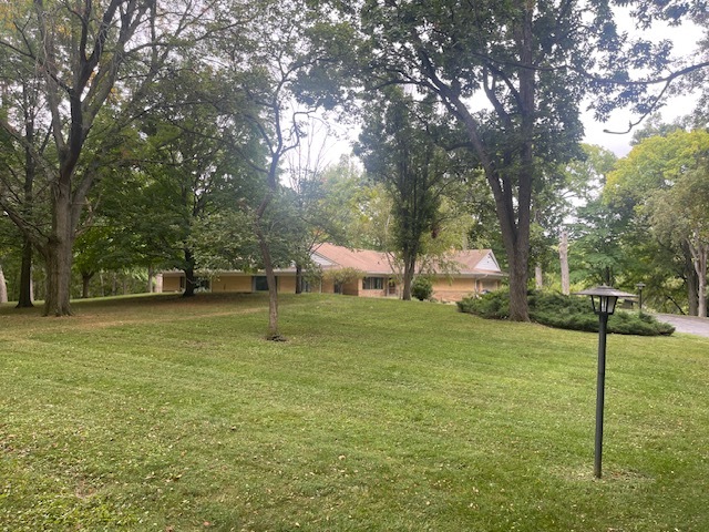 609 Ravine Road East Dundee, IL 60118 - Photo 1 of 15 a front view of a house with a yard and trees