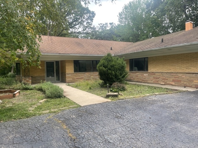 609 Ravine Road East Dundee, IL 60118 - Photo 15 of 15 a front view of house with yard and trees in the background