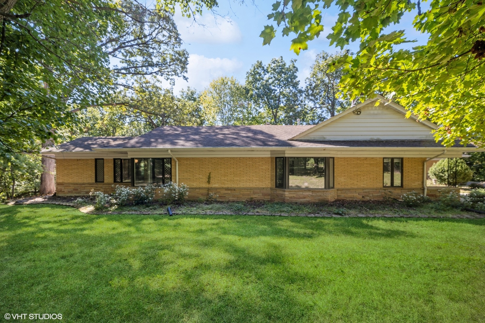 609 Ravine Road East Dundee, IL 60118 - Photo 3 of 15 a front view of a house with a garden