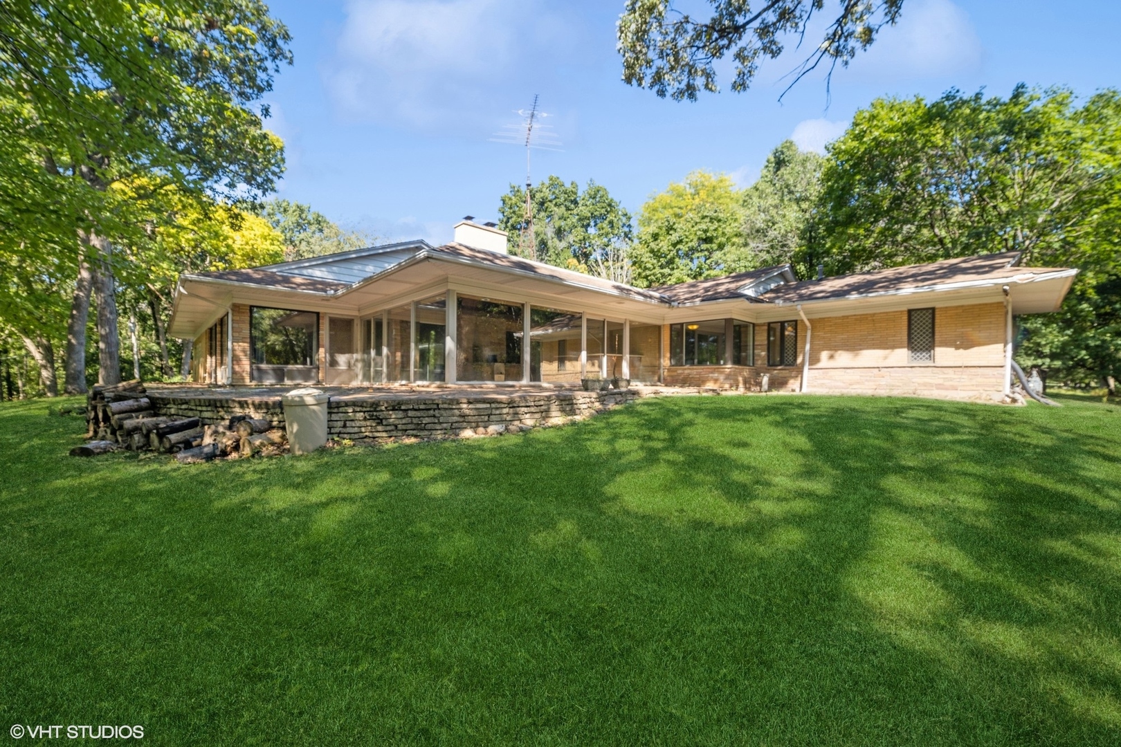 609 Ravine Road East Dundee, IL 60118 - Photo 4 of 15 a front view of a house with a yard table and chairs