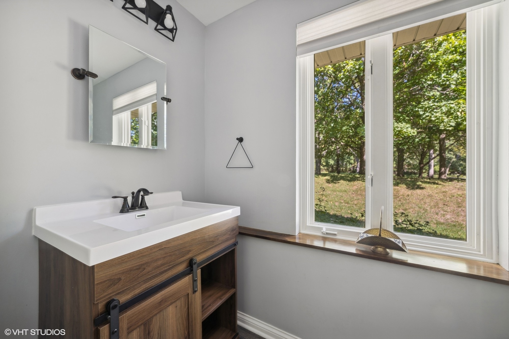 609 Ravine Road East Dundee, IL 60118 - Photo 6 of 15 a bathroom with a sink and a window