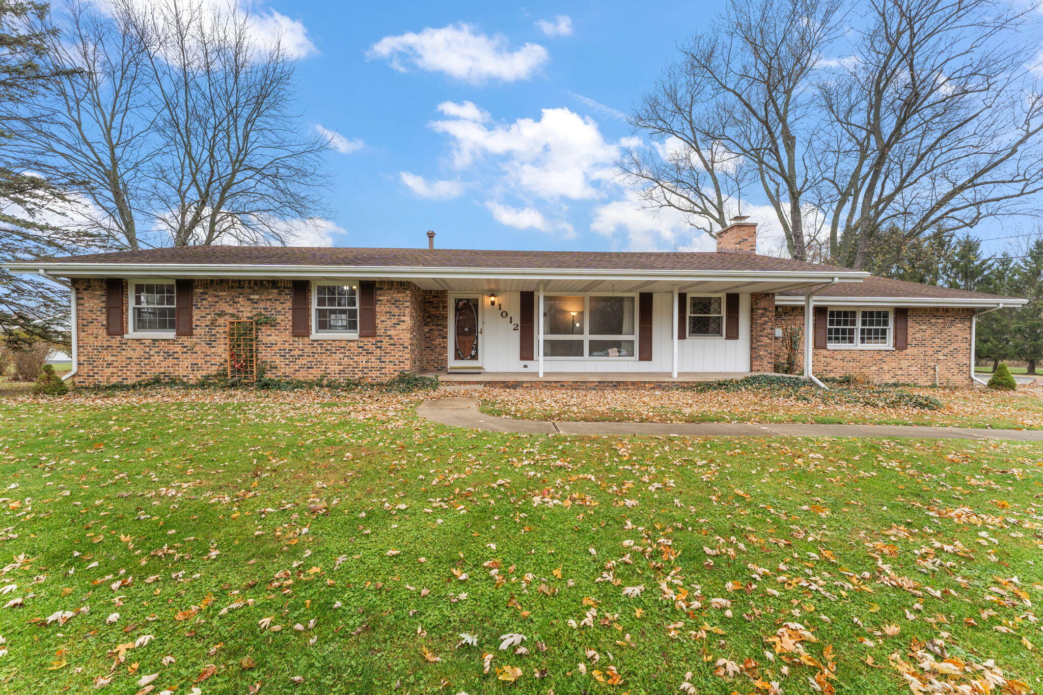 1012 Meridian Road Chesterton, IN 46304 - Photo 2 of 39 a front view of a house with a yard