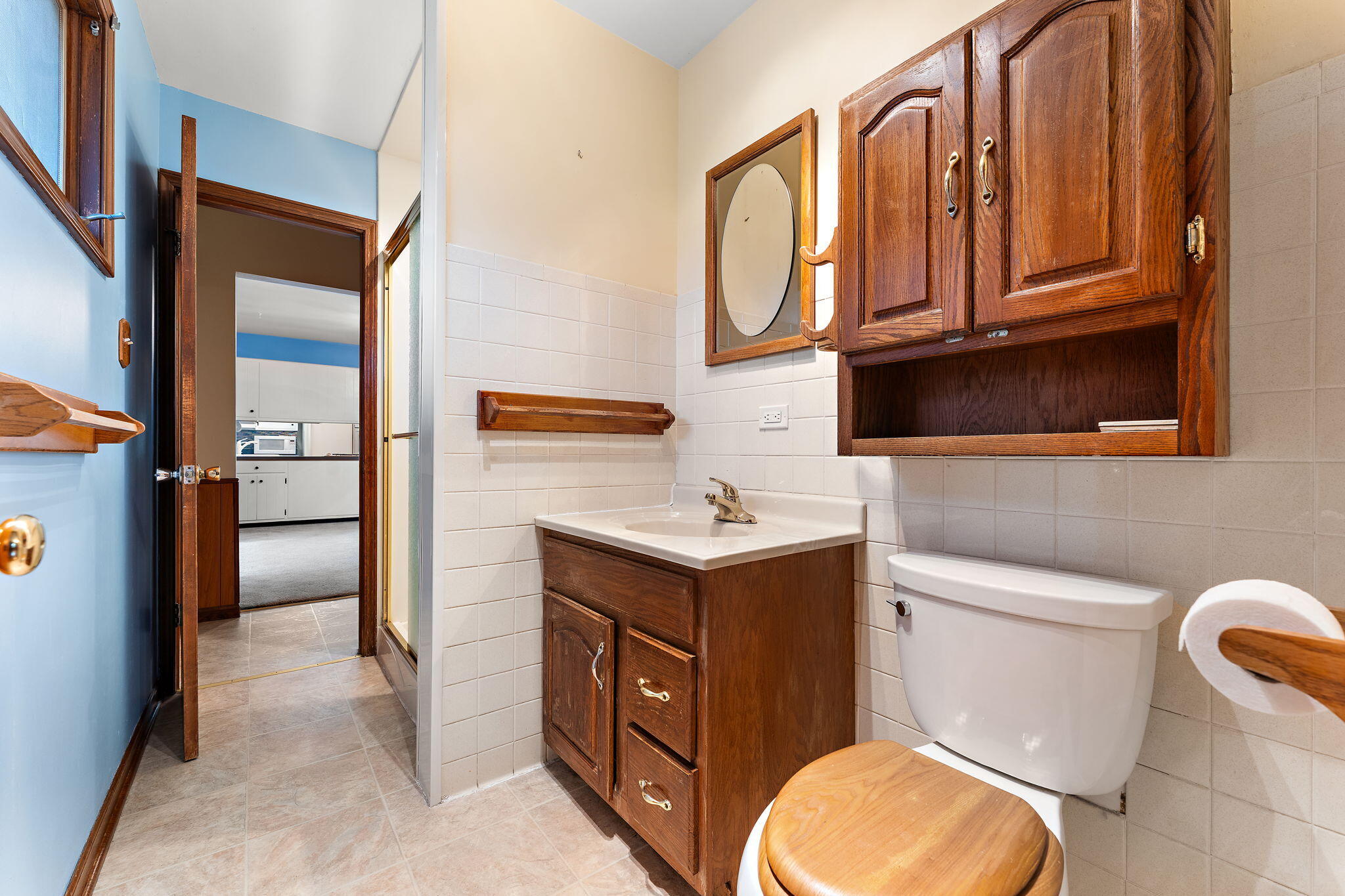 1012 Meridian Road Chesterton, IN 46304 - Photo 22 of 39 a bathroom with a toilet sink and mirror