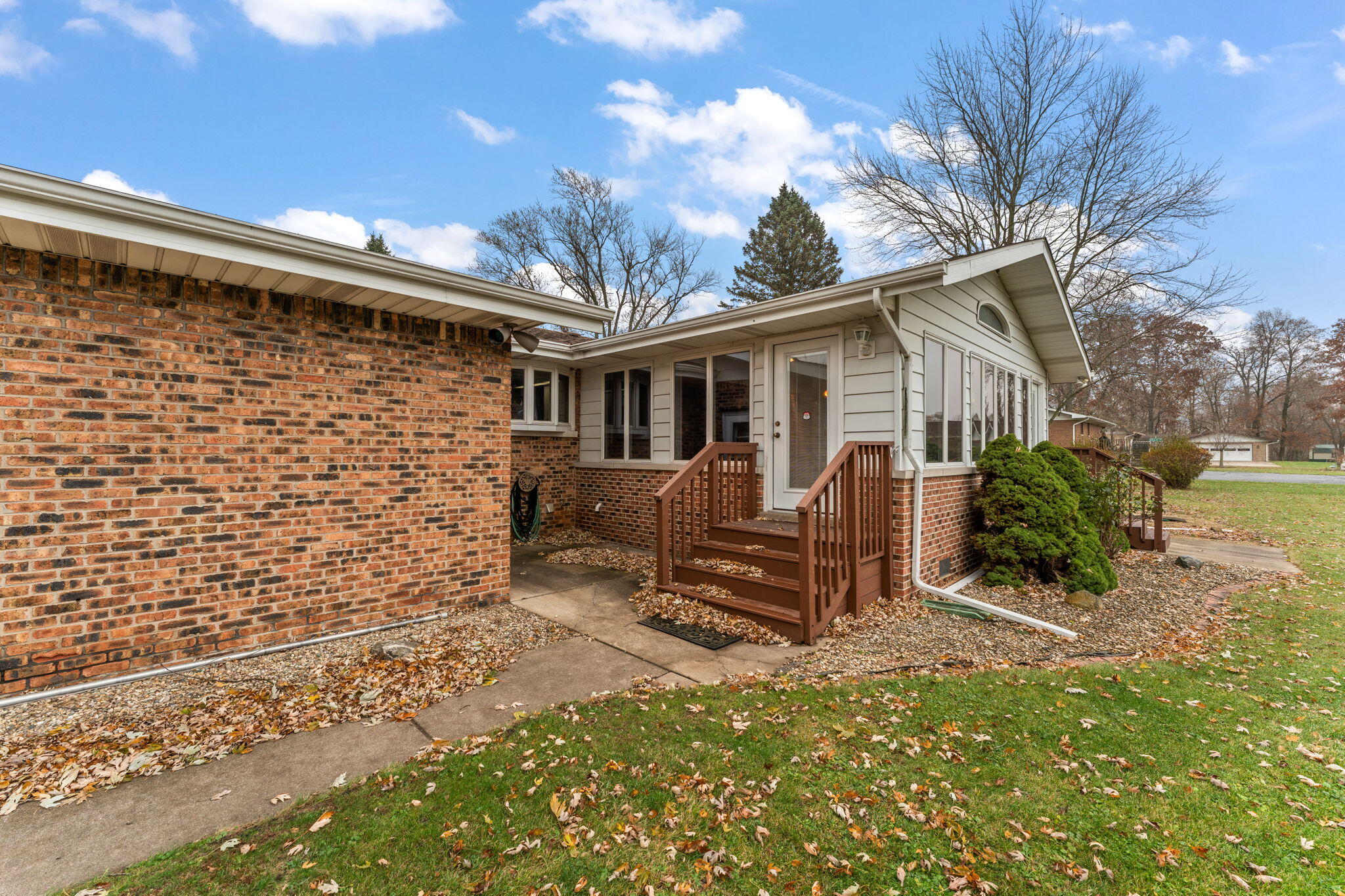 1012 Meridian Road Chesterton, IN 46304 - Photo 30 of 39 a view of a chair and table in backyard of the house