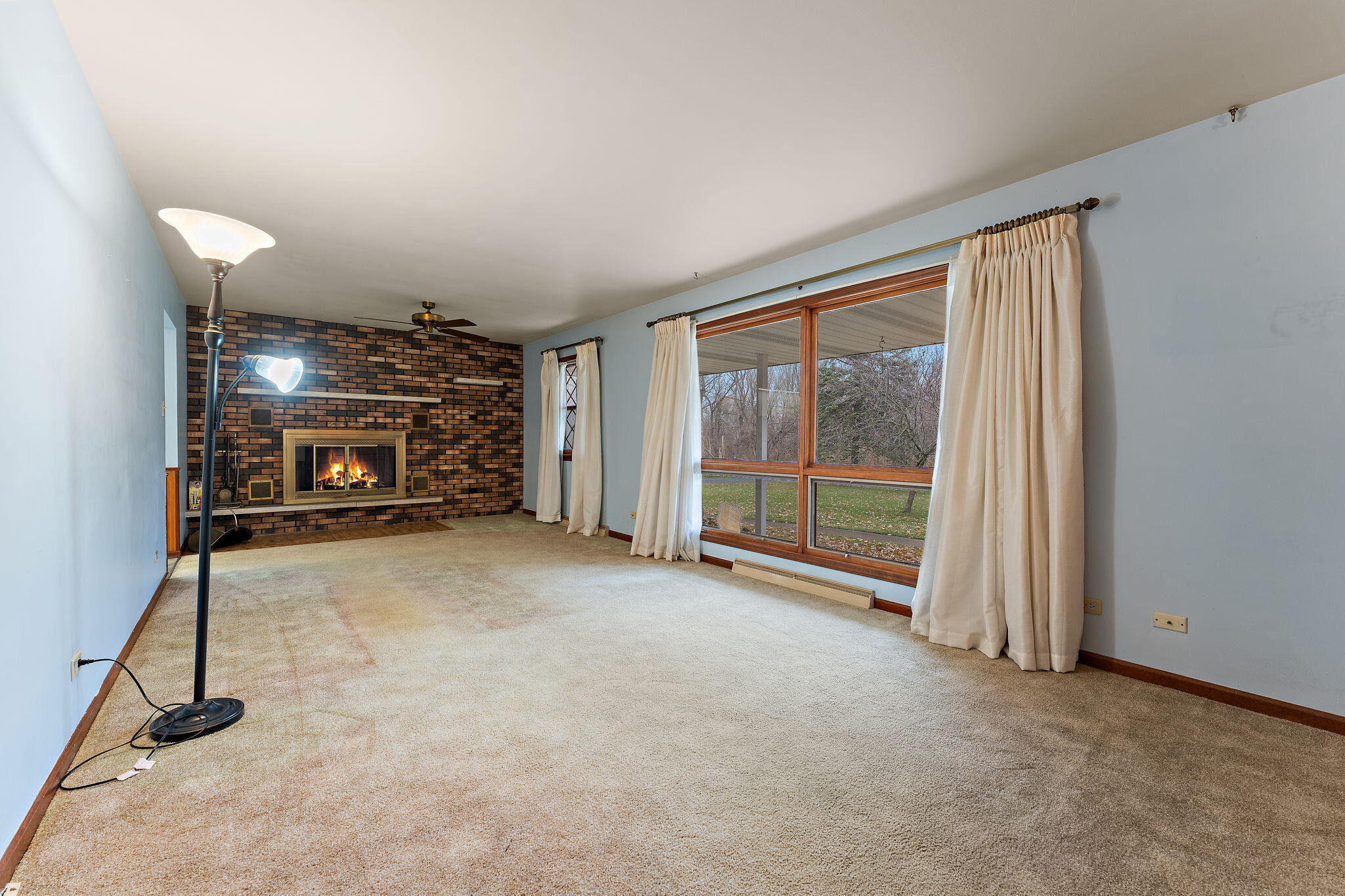1012 Meridian Road Chesterton, IN 46304 - Photo 6 of 39 a view of an empty room with a fireplace