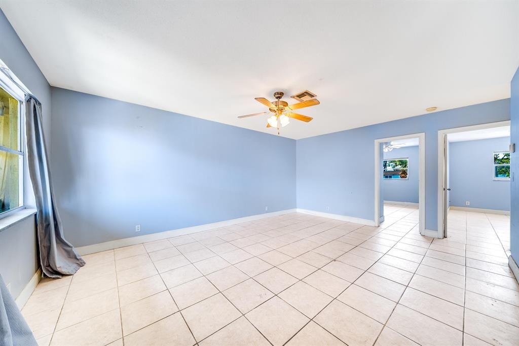 260 Northwest 19th Street, Unit 28 Boca Raton, FL 33432 - Photo 16 of 26 a view of an empty room and window