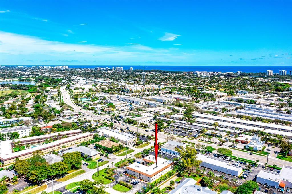260 Northwest 19th Street, Unit 28 Boca Raton, FL 33432 - Photo 20 of 26 an aerial view of residential building and ocean