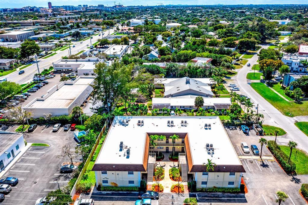 260 Northwest 19th Street, Unit 28 Boca Raton, FL 33432 - Photo 24 of 26 an aerial view of residential houses with outdoor space