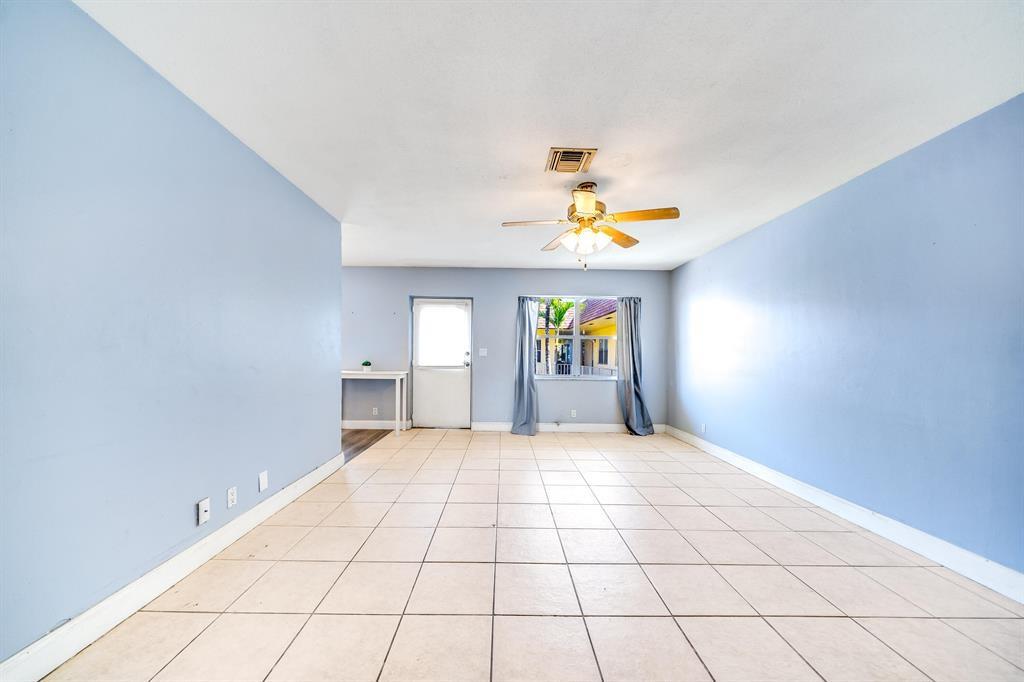 260 Northwest 19th Street, Unit 28 Boca Raton, FL 33432 - Photo 7 of 26 a view of an empty room and a window