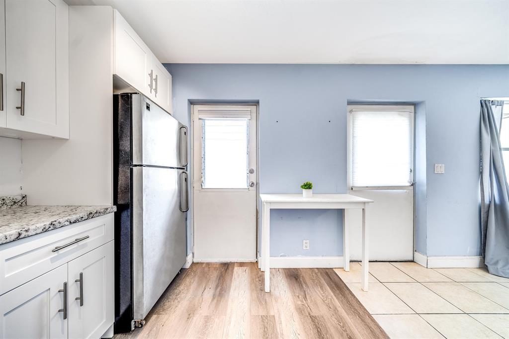 260 Northwest 19th Street, Unit 28 Boca Raton, FL 33432 - Photo 10 of 26 a view of a kitchen with a sink and cabinet