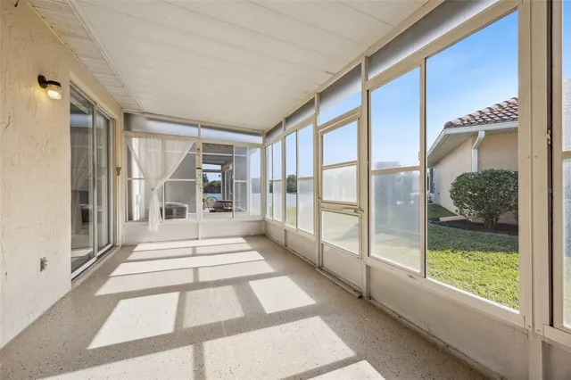 an aerial view of a house with outdoor space