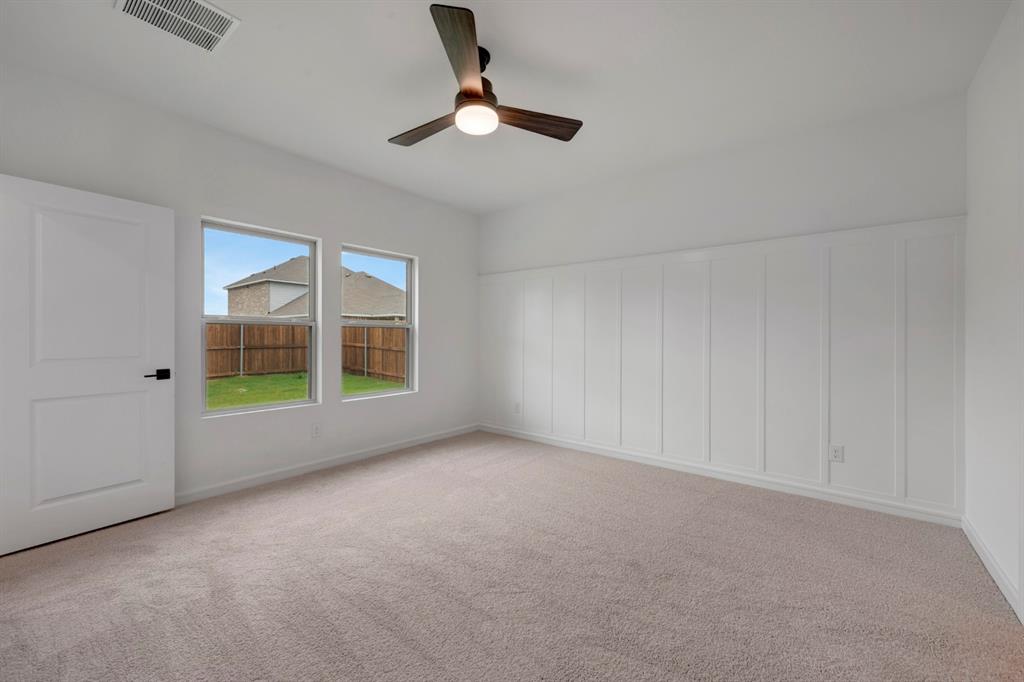 536 Brookside Drive Van Alstyne, TX 75495 - Photo 12 of 30 a view of an empty room with a window