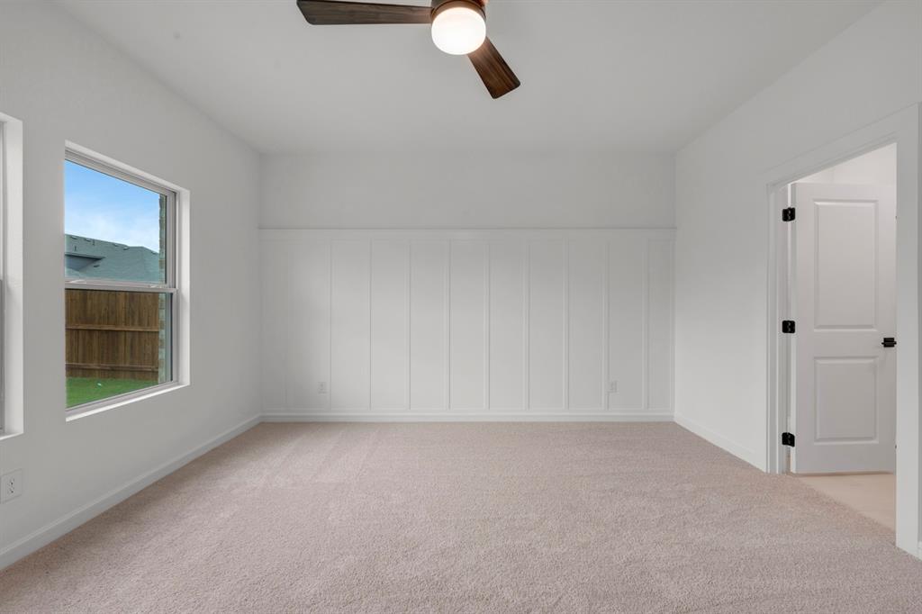536 Brookside Drive Van Alstyne, TX 75495 - Photo 13 of 30 a view of an empty room with a window