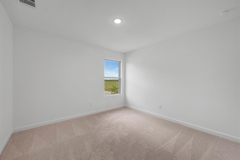 536 Brookside Drive Van Alstyne, TX 75495 - Photo 23 of 30 a view of an empty room with a window