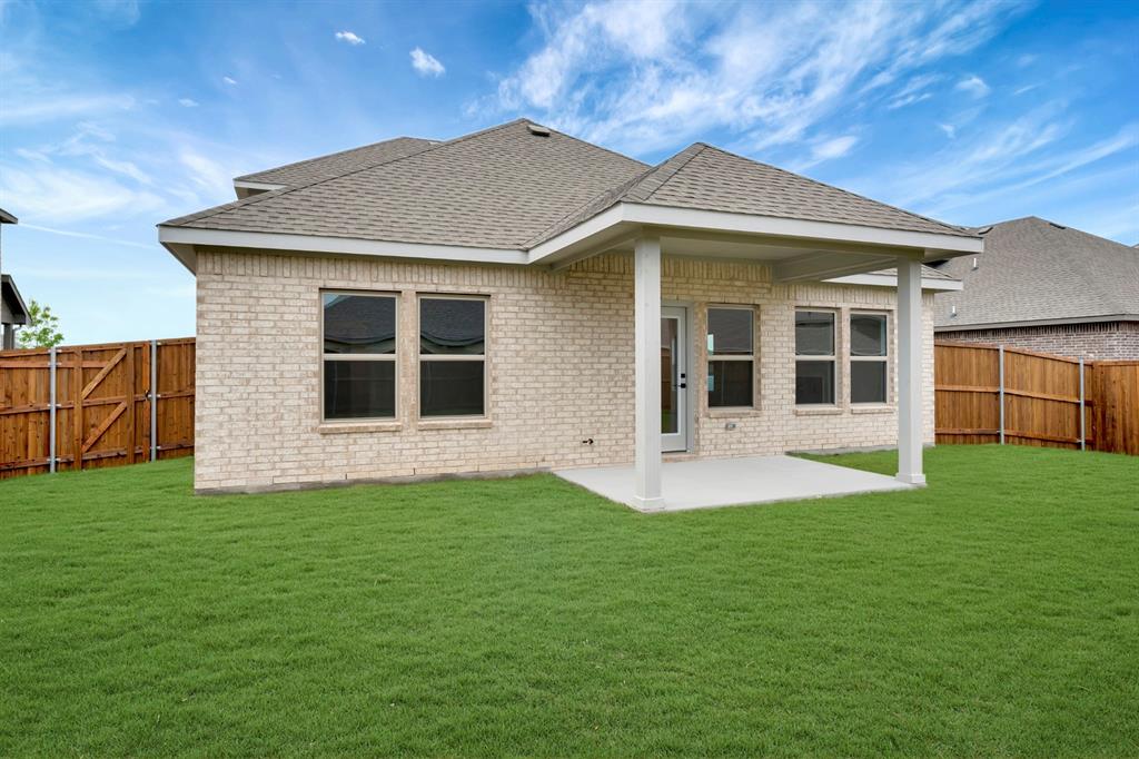 536 Brookside Drive Van Alstyne, TX 75495 - Photo 27 of 30 a view of a house with a yard