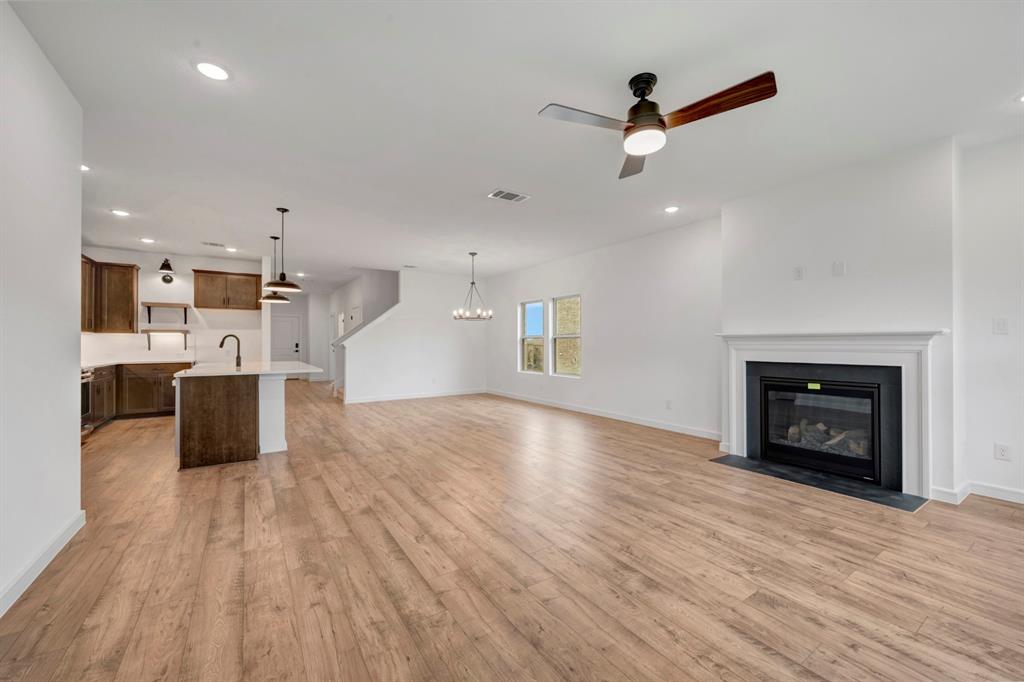 536 Brookside Drive Van Alstyne, TX 75495 - Photo 6 of 30 a view of a kitchen with cabinets and wooden floor