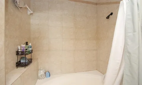 a view of bathroom with shower