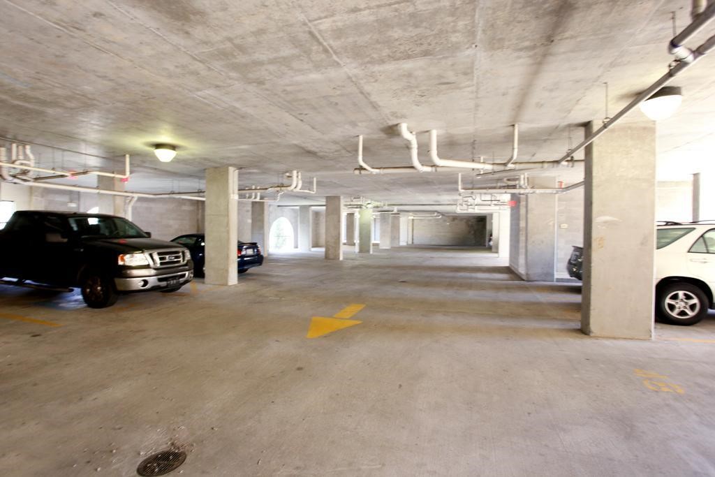 2203 Dorrington Street, Unit 208 Houston, TX 77030 - Photo 24 of 32 a view of a car park in front of house