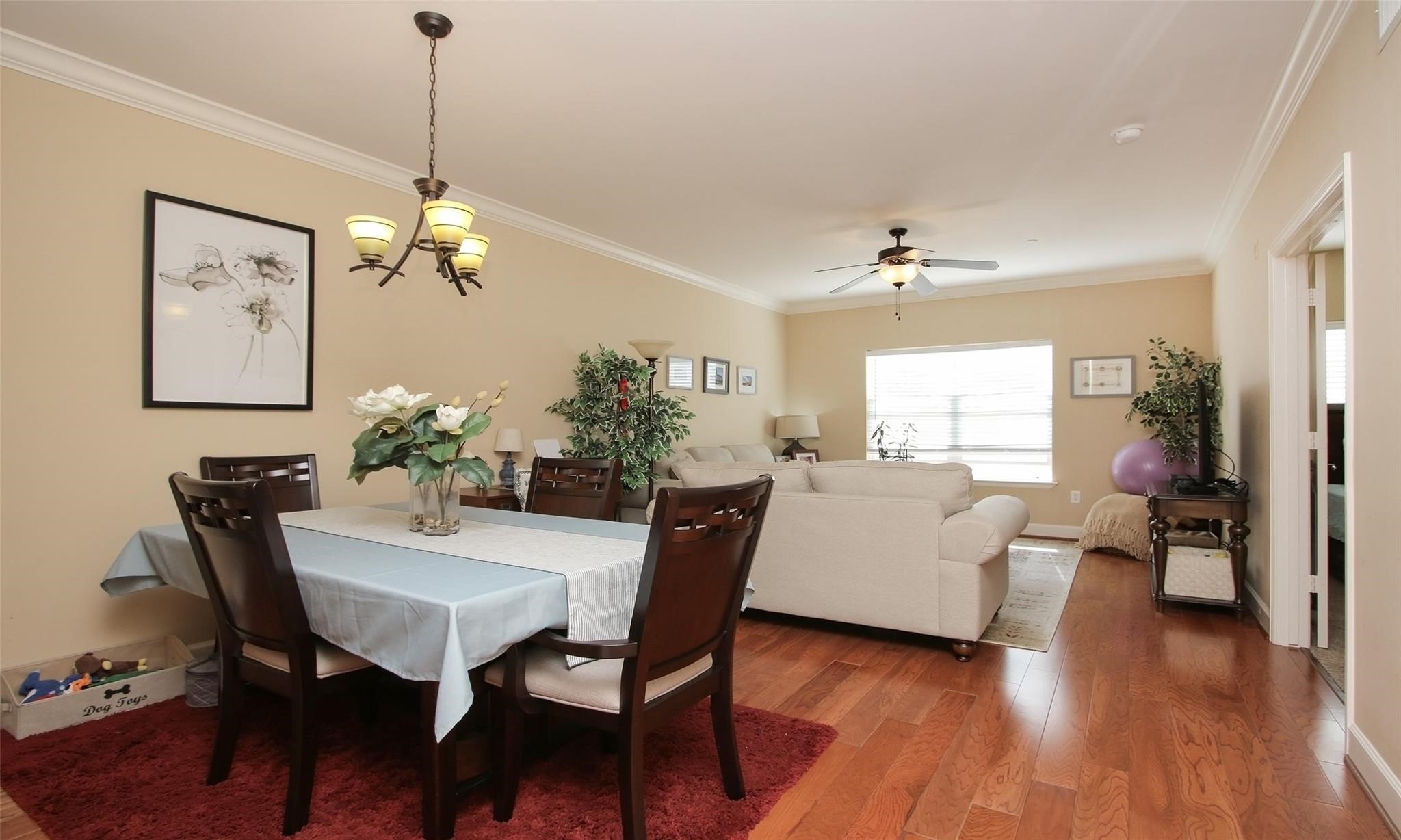 2203 Dorrington Street, Unit 208 Houston, TX 77030 - Photo 6 of 32 a view of a dining room with furniture window and wooden floor
